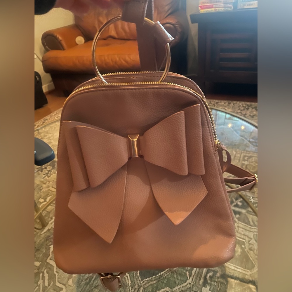 Pink bow backpack